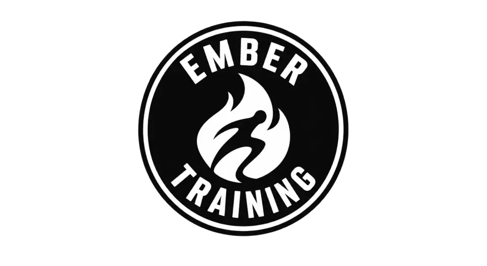 Ember Training emblem logo idea: The moving flame gives this round training seal a clear link to Ember while keeping the overall look classic and energetic.