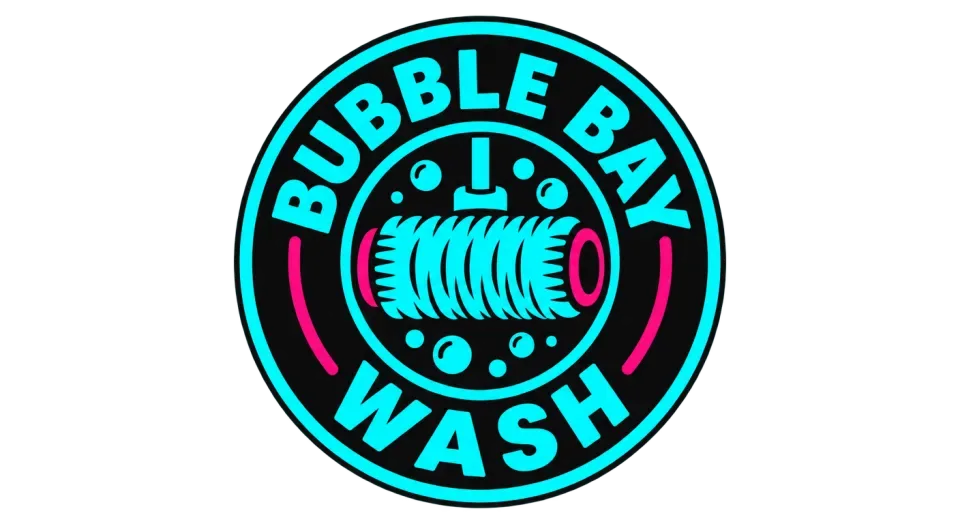 Bubble Bay Wash emblem logo idea: The circular seal makes the brush the focal point while the curved name gives the wash a welcoming, established look.