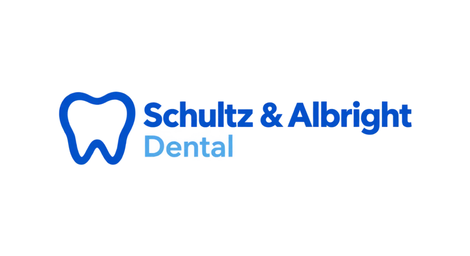 Schultz & Albright Dental combination mark logo idea: A crisp tooth outline beside the practice name makes the dental service easy to recognize while keeping the overall look calm and understated.