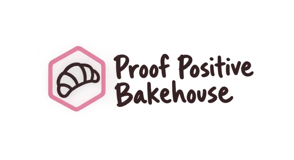 Proof Positive Bakehouse combination mark logo idea: A simple inked croissant beside the full name gives Proof Positive Bakehouse the feel of a friendly neighborhood bakery.