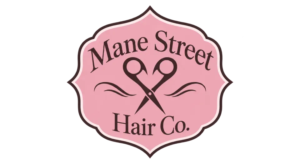 Mane Street Hair Co. emblem logo idea: A heart-shaped pair of scissors gives this salon badge a warm, unmistakably hair-focused center.