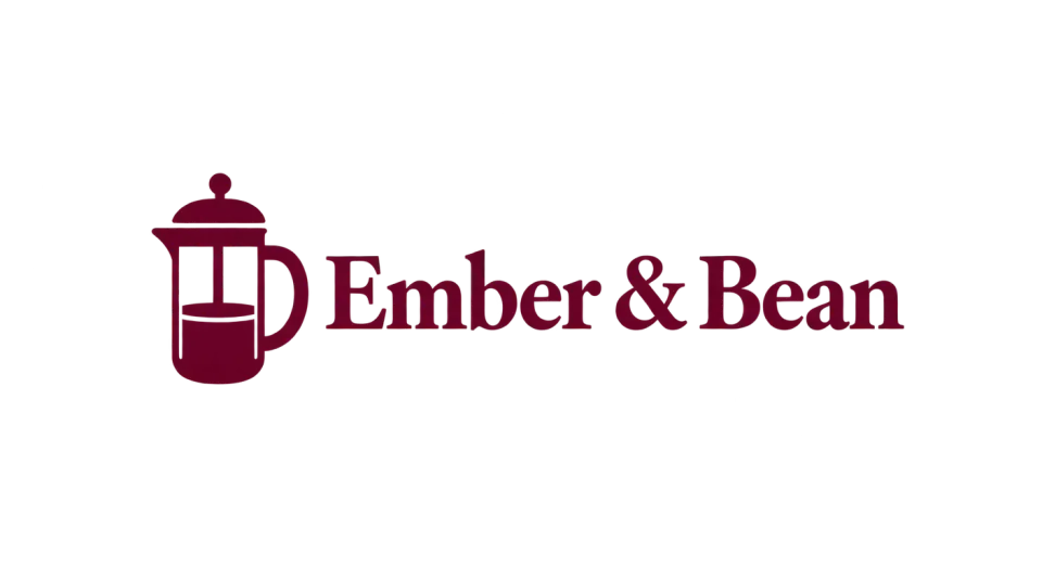 Ember & Bean combination mark logo idea: A simple French press beside Ember & Bean makes the shop’s coffee craft feel personal and welcoming.