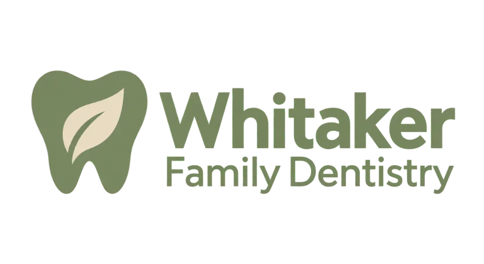 Whitaker Family Dentistry combination mark logo idea: A simple leaf tucked into a tooth gives Whitaker Family Dentistry a clear dental symbol with a gentle natural touch.