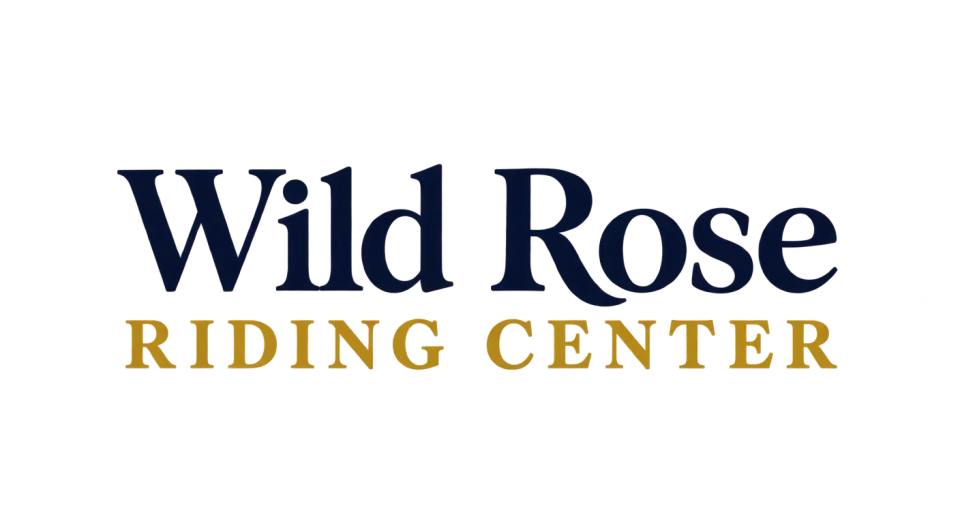 Wild Rose Riding Center wordmark logo idea: The stacked name feels grounded and welcoming, with a clear distinction between Wild Rose and the riding center it names.