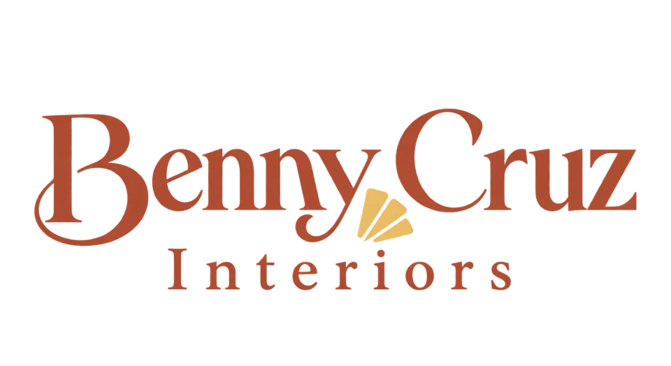 Benny Cruz Interiors wordmark logo idea: A tiny paint-swatch fan tucked into the lettering gives this moody, spacious wordmark a subtle nod to the work of an interiors studio.
